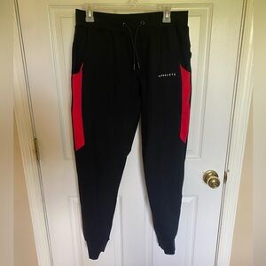 Alphalete joggers - black with red stripe, size L